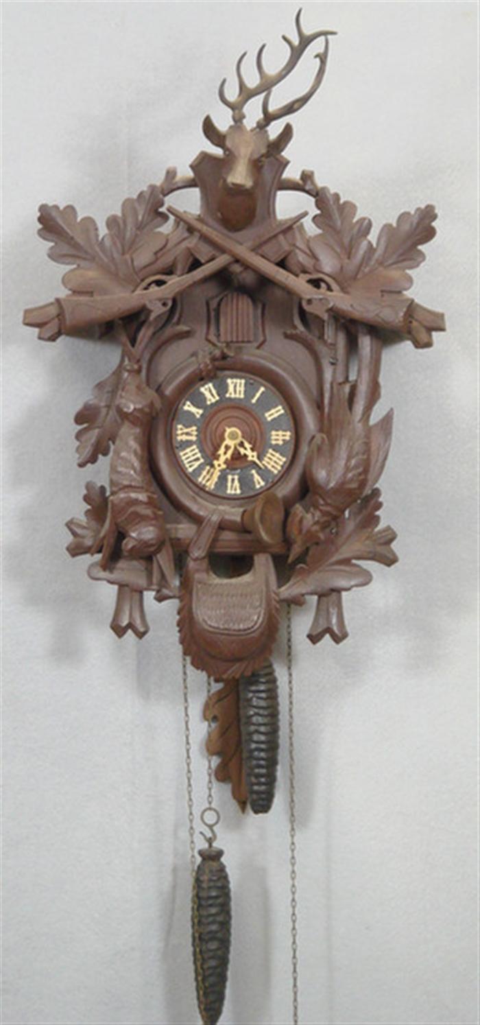 Appraisal: Carved Black Forest cuckoo clock deer head hanging game oak