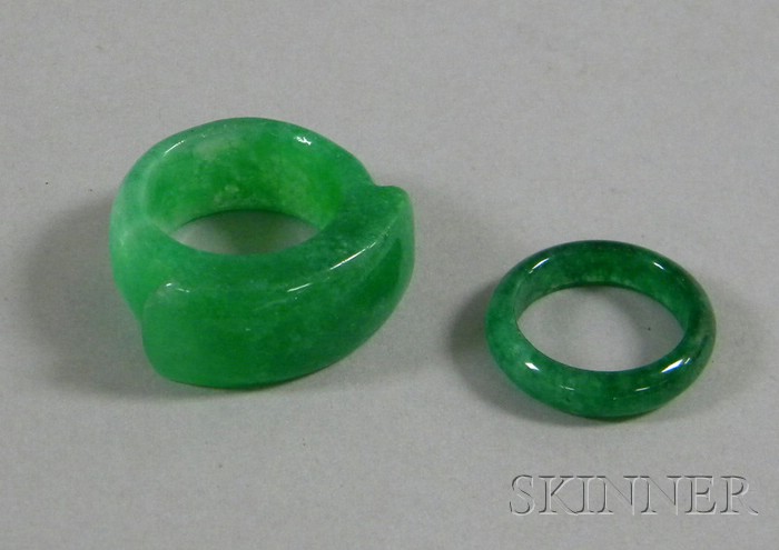 Appraisal: Two Asian Green Stone Rings one saddle ring both cased