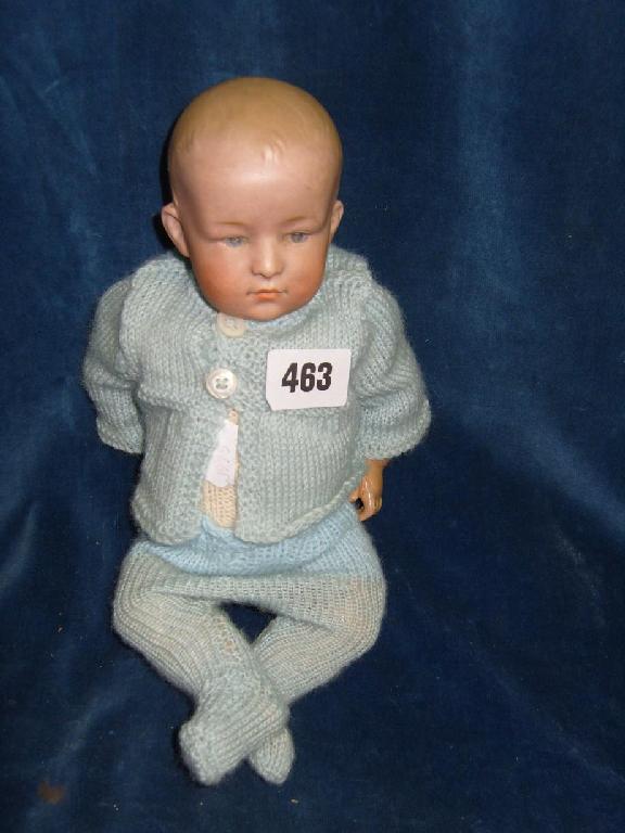 Appraisal: A German bisque headed baby doll with painted eyes composition