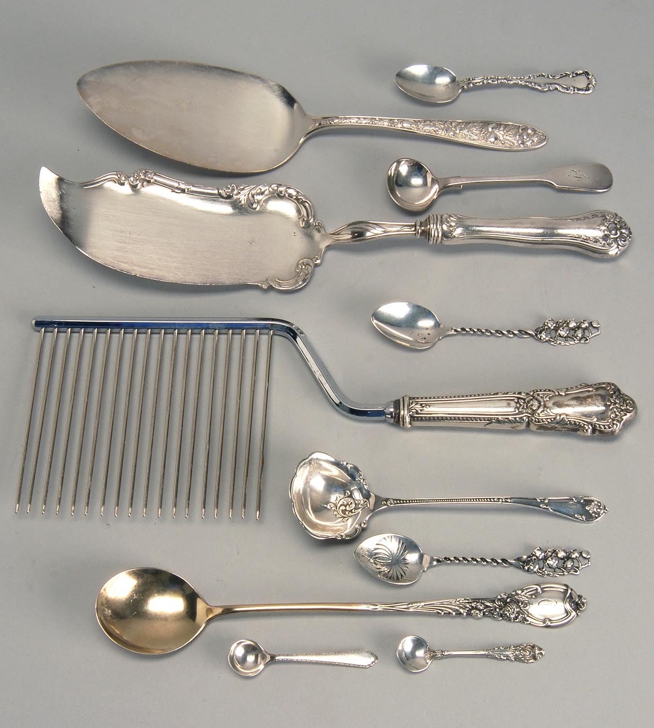 Appraisal: ELEVEN PIECES OF STERLING SILVER AND SILVER PLATED FLATWARE by