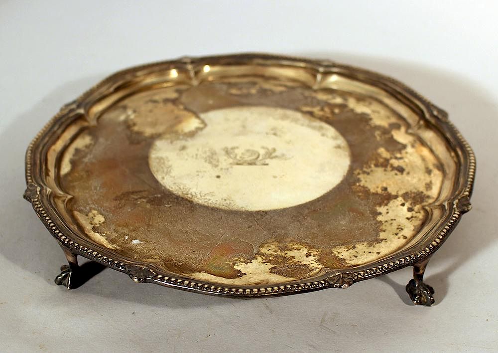 Appraisal: English silver tray English silver tray on three claw feet