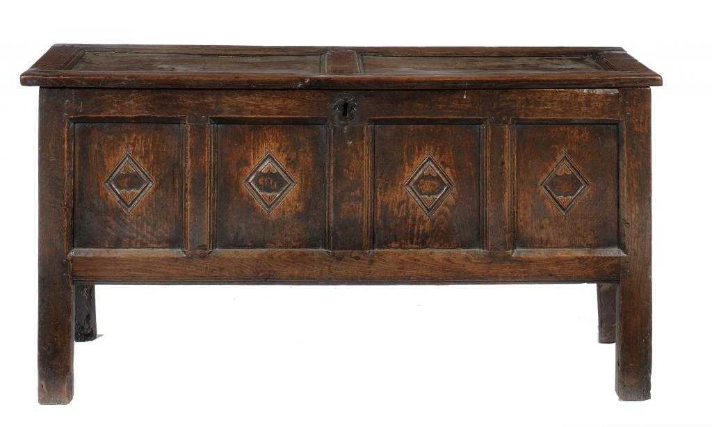 Appraisal: AN ENGLISH JOINED OAK CHEST with twin panelled lid the