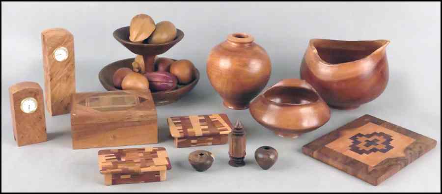 Appraisal: COLLECTION OF HAND CRAFTED WOOD DECORATIVE OBJECTS Comprising vases bowls