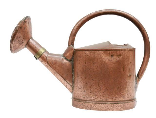 Appraisal: Large English copper watering can th c decorative brass band