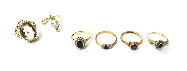 Appraisal: A ct gold sapphire and diamond set oval cluster ring