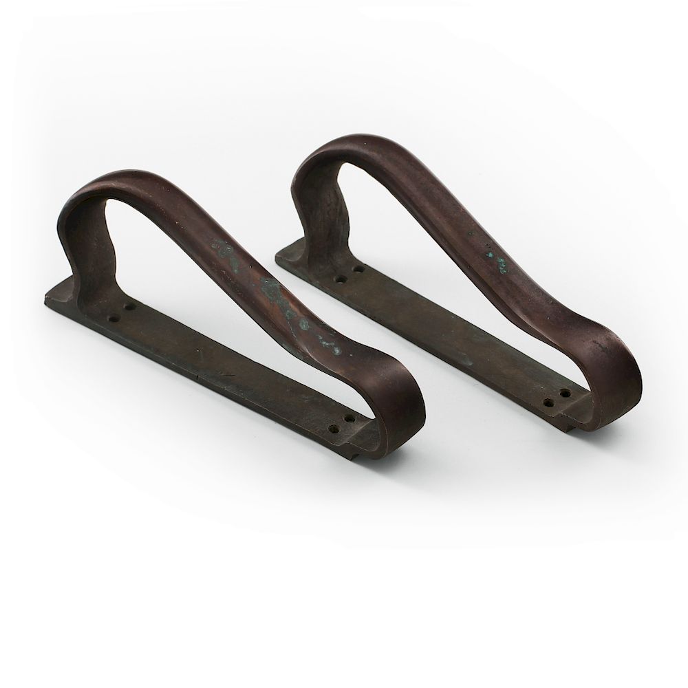 Appraisal: Alvar Aalto A pair of sculptural bronze door handles by