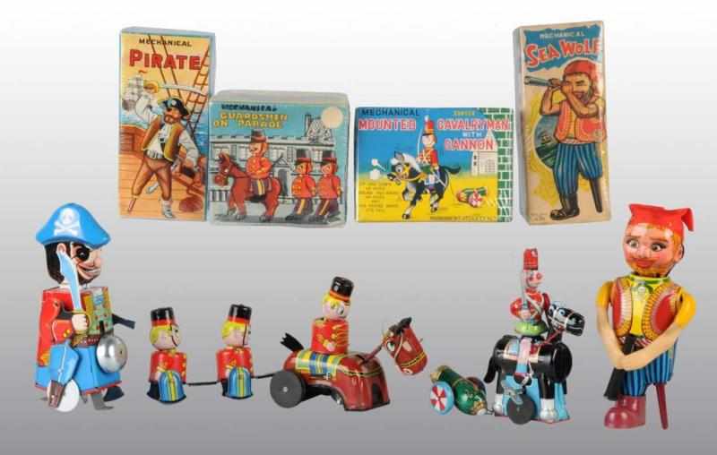 Appraisal: Lot of Tin Pirate Soldier Wind-Up Toys Description Japanese Working