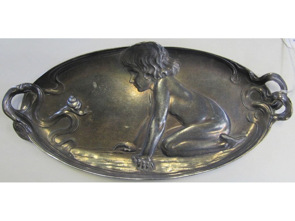 Appraisal: Pewter dish with Art Nouveau style decoration of a young