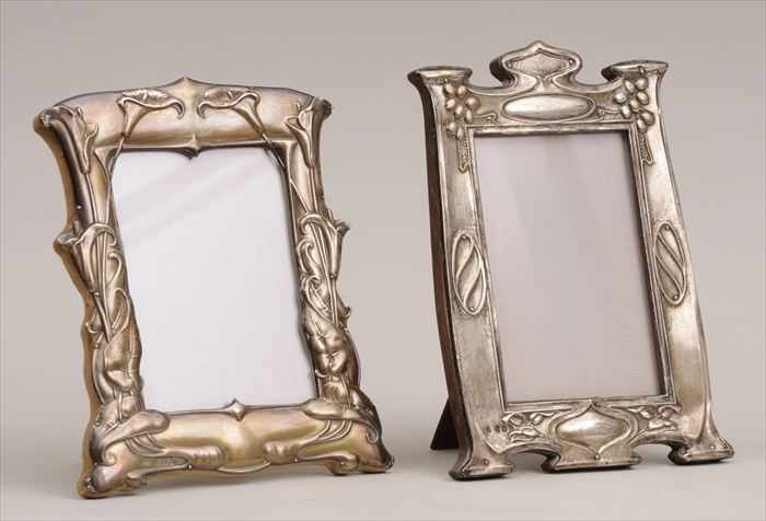 Appraisal: TWO ENGLISH ART NOUVEAU SILVER PICTURE FRAMES Marks for Birmingham