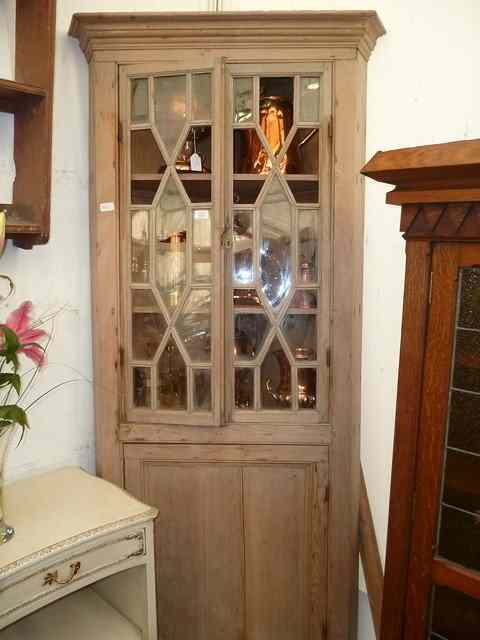 Appraisal: AN TH CENTURY PINE FULL HEIGHT CORNER CUPBOARD with astragal