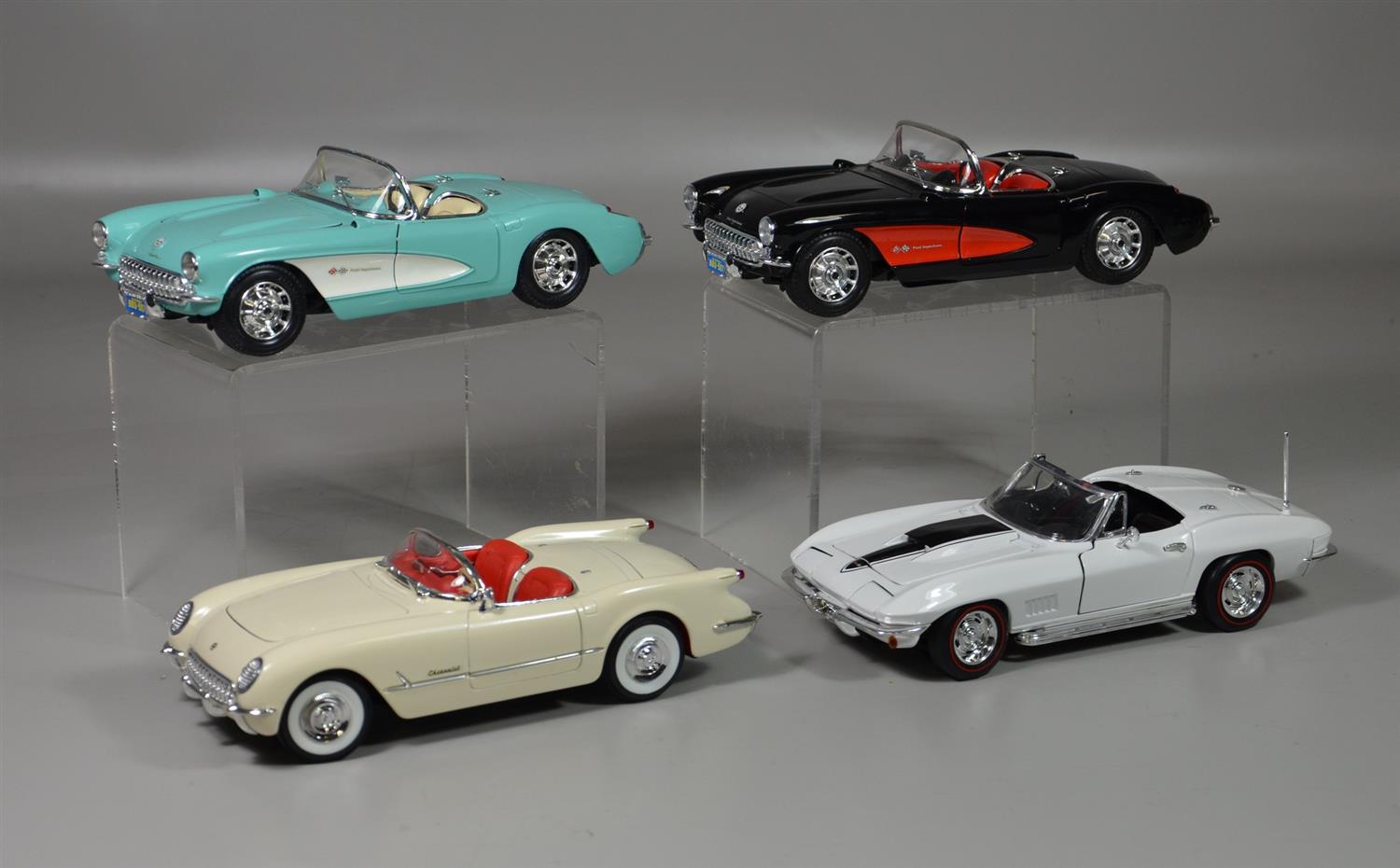 Appraisal: Scale Model Chevrolet Corvette cars Burago green Burago black Mira