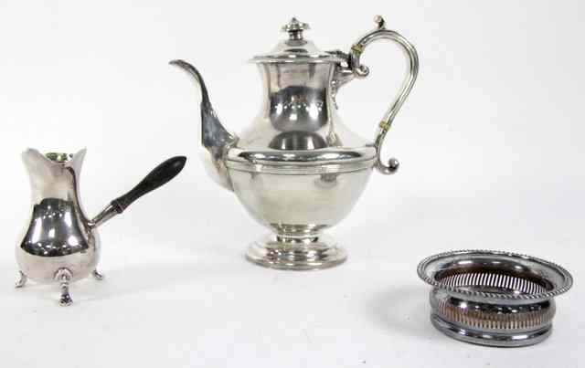 Appraisal: A pear shaped coffee pot by Matthew Boulton with hinged