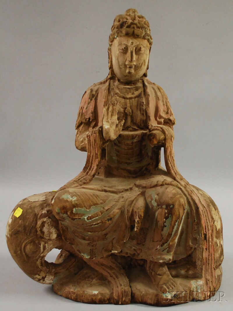 Appraisal: Asian Polychrome-painted Carved Wood Figure of Buddha Sitting atop a