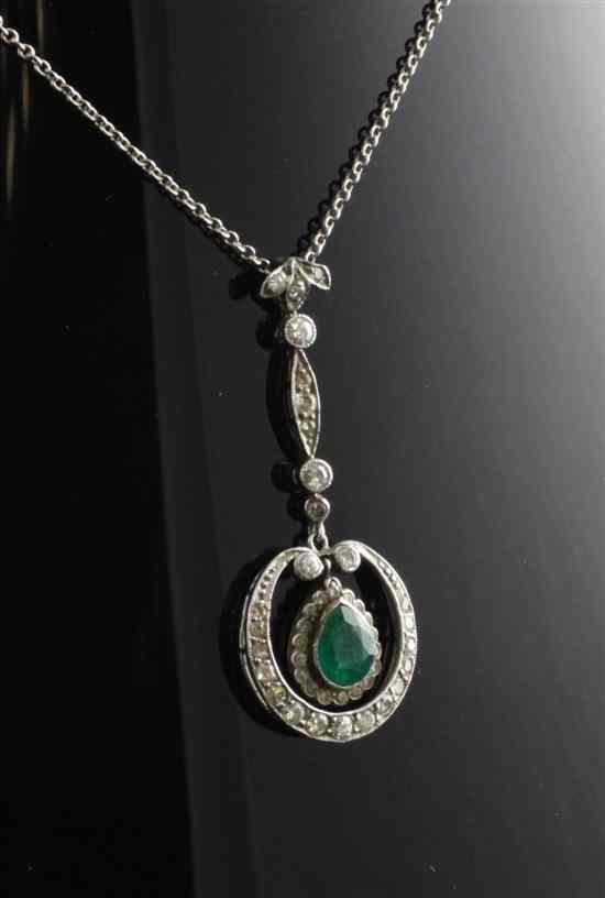 Appraisal: An early th century emerald and diamond set white gold