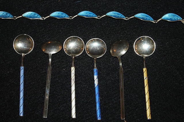 Appraisal: A SET OF SIX NORWEGIAN SILVER COFFEE SPOONS with coloured