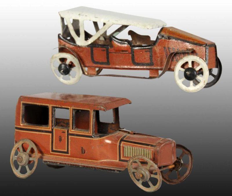 Appraisal: Lot of Tin Automobile Penny Toys Description German One is