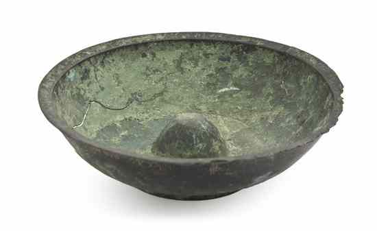 Appraisal: A Middle Eastern Bowl of circular footed form with inverted