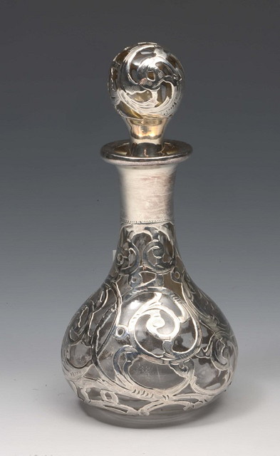 Appraisal: A GLASS SCENT BOTTLE of baluster form with stopper with