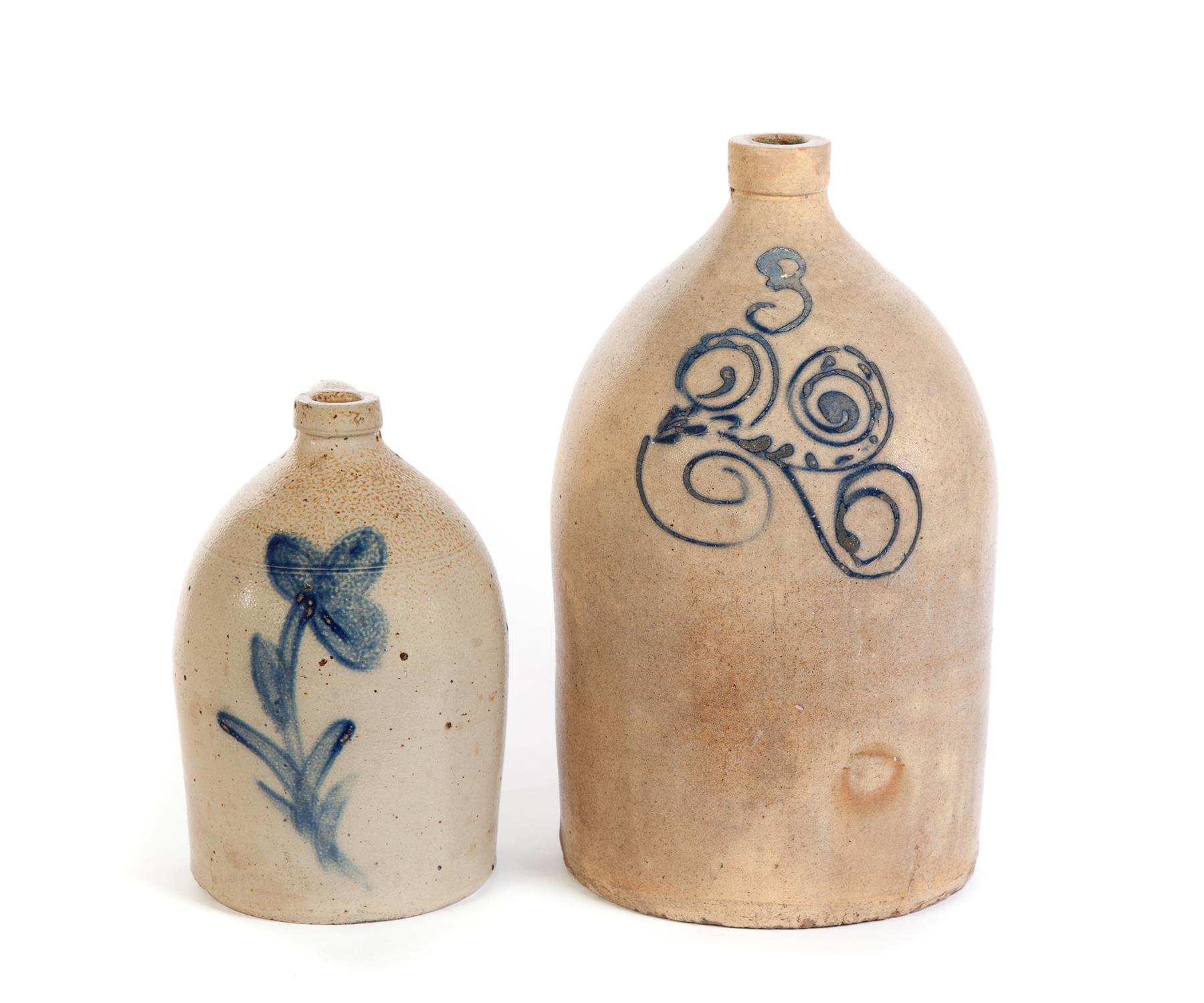 Appraisal: TWO STONEWARE JUGS WITH FREEHAND COBALT DECORATION American nd half-