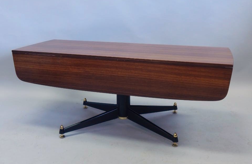 Appraisal: An unusual retro G-Plan walnut coffee and dining table with