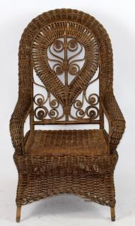 Appraisal: Heywood Wakefield style wicker armchair Wicker armchair in the style