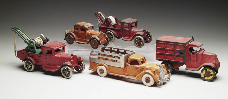 Appraisal: LOT OF TOYS Orange Hubley stake truck SIZE l Red