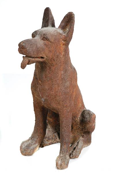 Appraisal: A pair of cast iron figures of German sheppard dogs