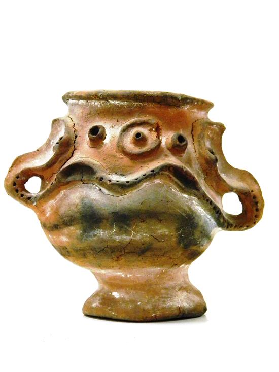 Appraisal: New Guinea red clay pot handles represent noses on faces