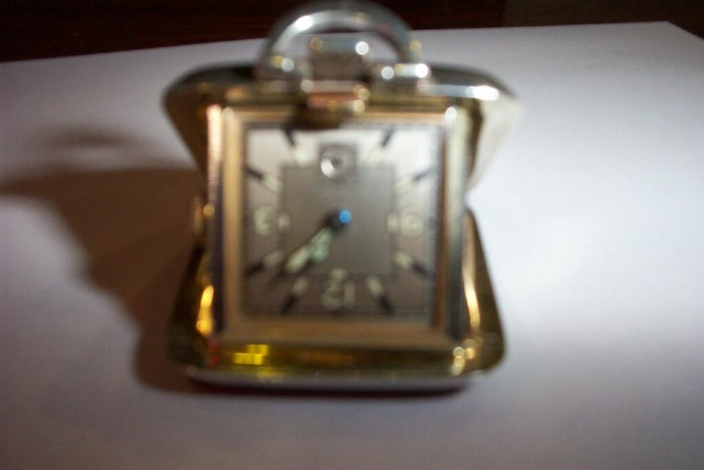 Appraisal: A silver gilt travelling fob timepiece with illuminous numerals the