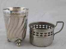 Appraisal: A three footed silver plated ''sack race'' presentation beaker by