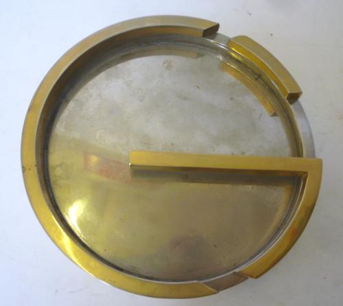 Appraisal: A GUCCI ASHTRAY of circular form with asymmetrical gilt gallery