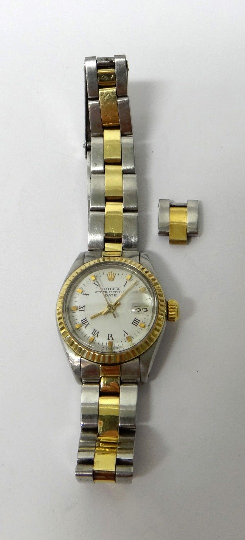 Appraisal: A lady's steel and gold Rolex Oyster Perpetual Date bracelet