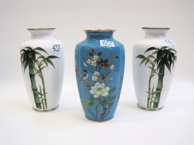 Appraisal: THREE JAPANESE CLOISONNE VASES pair with bamboo design on white