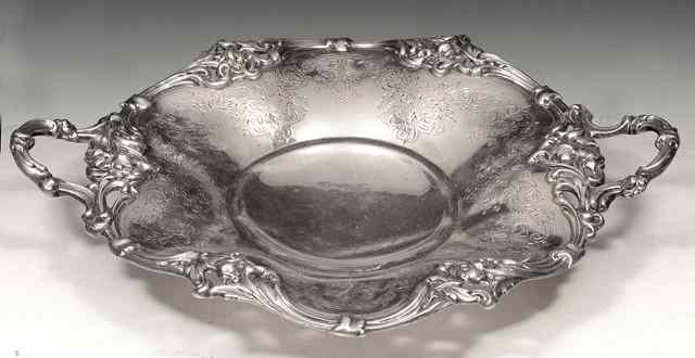 Appraisal: A VICTORIAN SILVER TWO HANDLED DISH with pierced scroll and