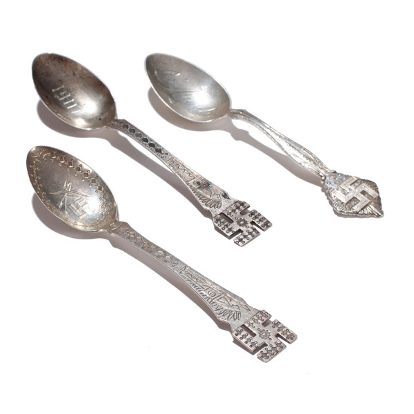 Appraisal: Three sterling silver collector spoons with Swastika good luck whirling