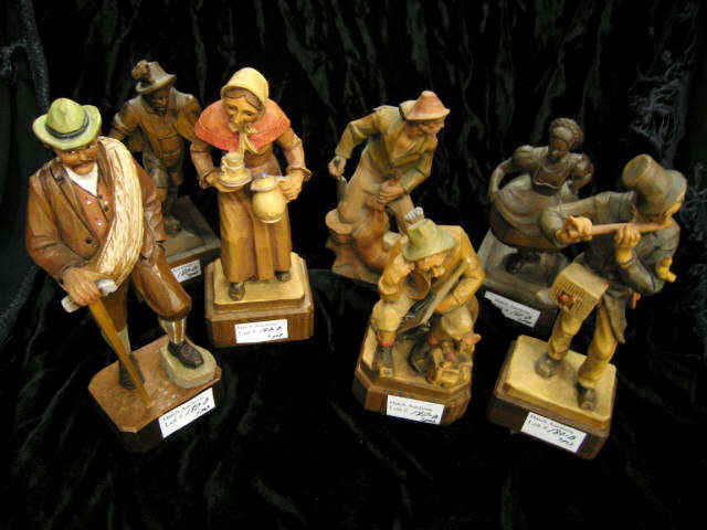 Appraisal: Collection of Carved Wood Figurines Anri others