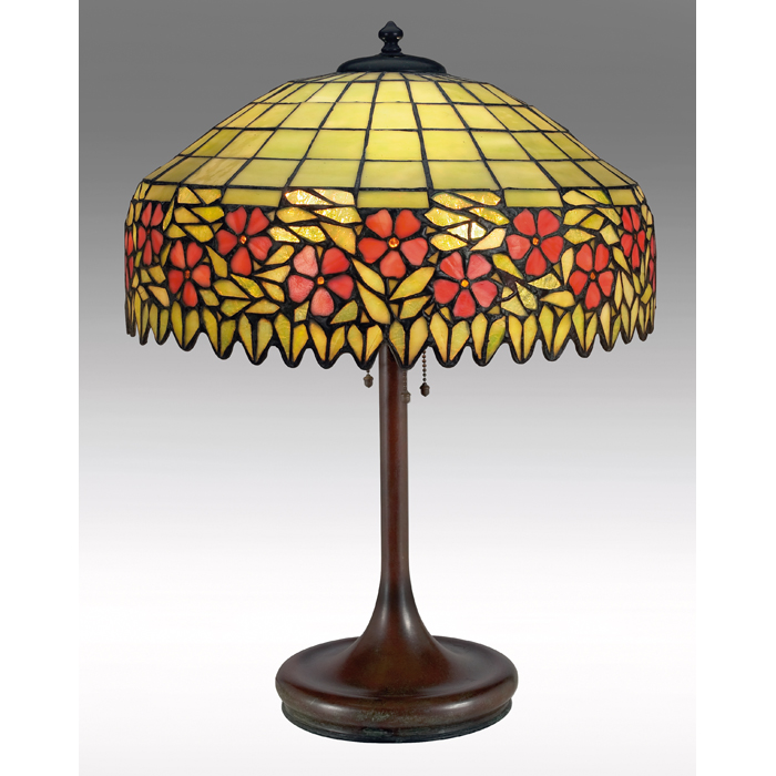 Appraisal: Handel lamp attribution bronzed metal base supporting a leaded glass