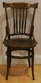 Appraisal: An Edwardian beech spindle back occasional chair