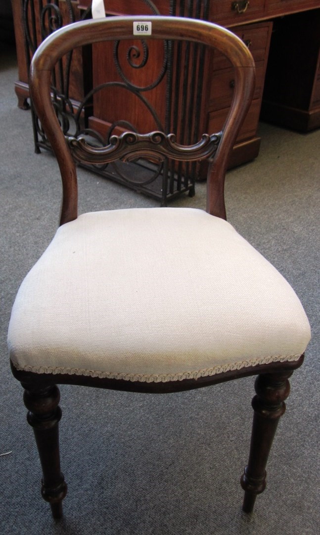 Appraisal: A set of four walnut spoonback campaign chairs by Ross