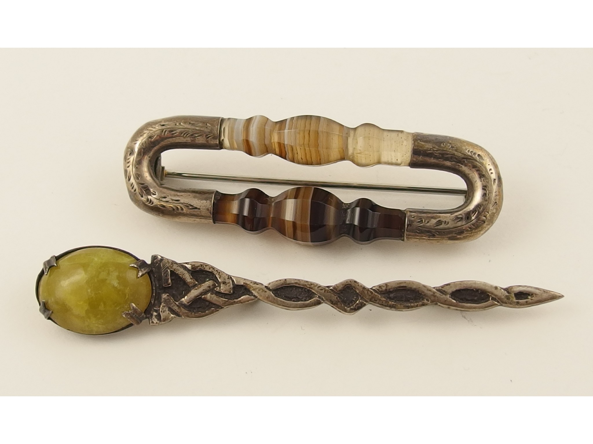 Appraisal: A Scottish agate brooch together with a Connemara marble silver