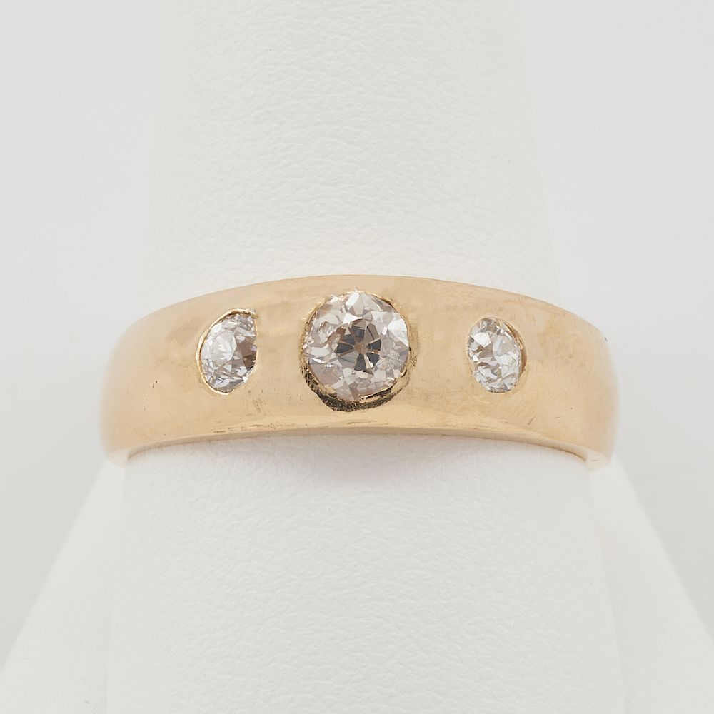 Appraisal: k Yellow gold three diamond gypsy ring k Yellow gold