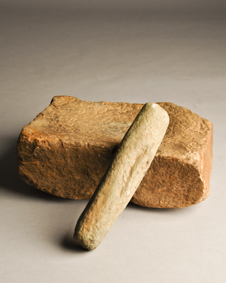 Appraisal: A Native American Grinding Stone and Pestle Grinding stone high