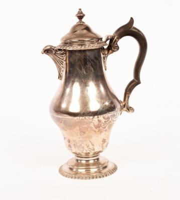 Appraisal: A silver hot water jug Pearce Sons London with hinged