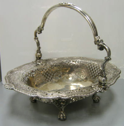 Appraisal: S HERBERT COMPANY LONDON Early Georgian silver pierced cake basket