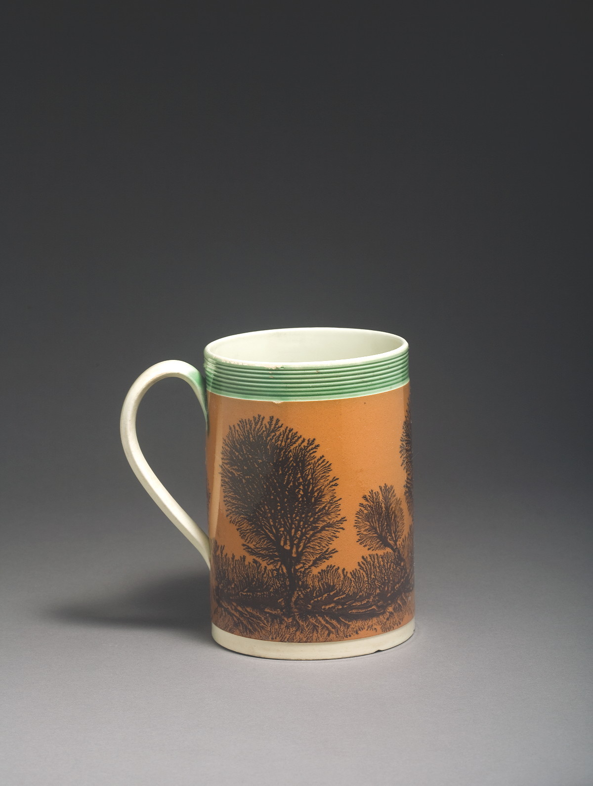 Appraisal: BRITISH PEARLWARE MOCHAWARE QUART MUG CIRCA Surrounded by dendritic trees