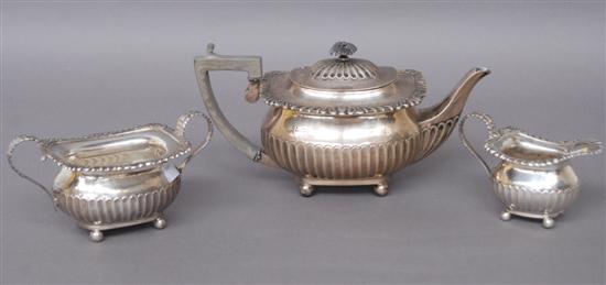 Appraisal: THREE PIECE ENGLISH STERLING TEA SET Teapot sugar and creamer