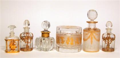 Appraisal: Group of four Continental gilt metal mounted glass fragrance bottles