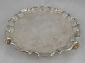 Appraisal: An Old Sheffield plate waiter with chippendale rim and chased