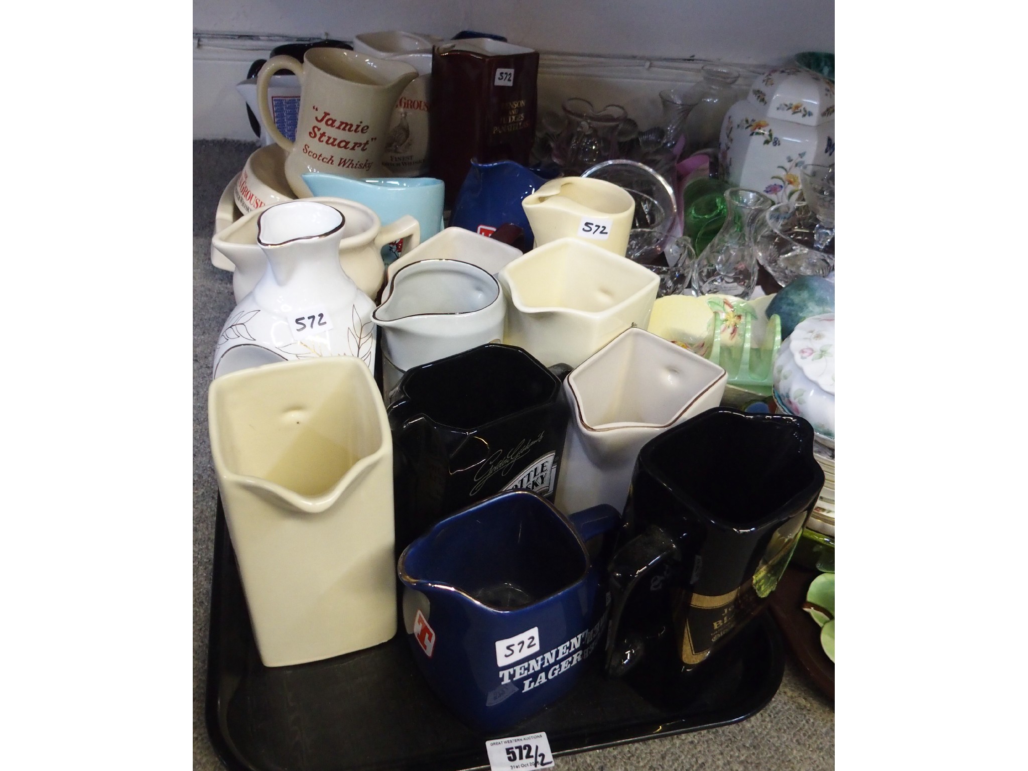 Appraisal: Two trays comprising various whisky and spirits jugs