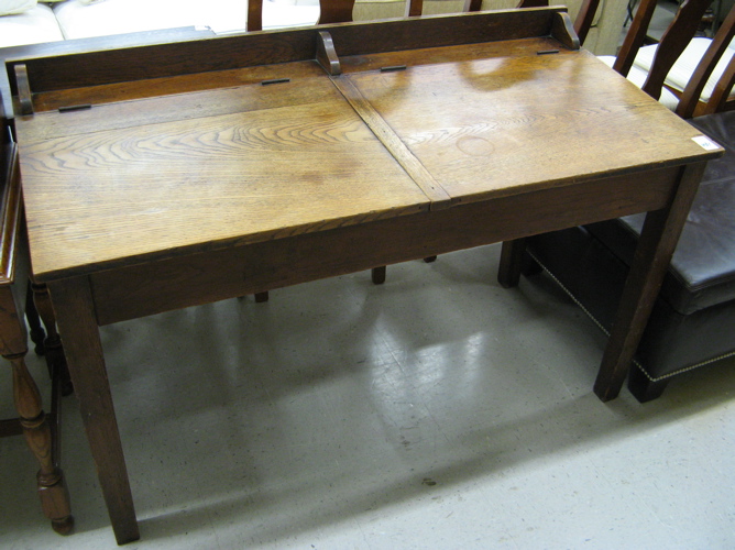 Appraisal: AN OAK STUDENTS' DESK American early th century the table-like